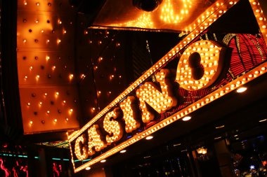 User navigating slot games adjacent to sportsbook markets on device