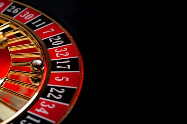 Casino chips and roulette wheel